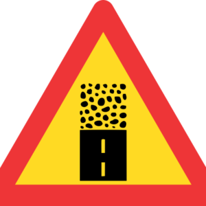 TW325 - Temporary Gravel Road Begins Road Sign